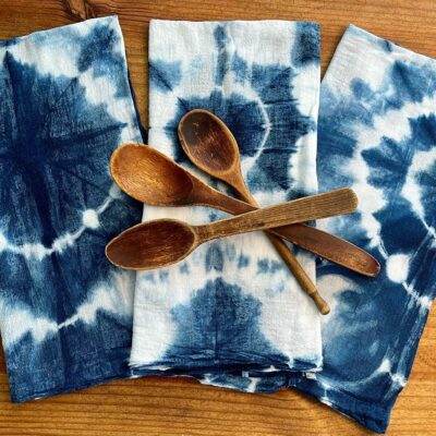 Hand-dyed home goods using traditional indigo methods - kitchen & bath linens, decorative pillows, blankets, and bags. All 100% cotton.