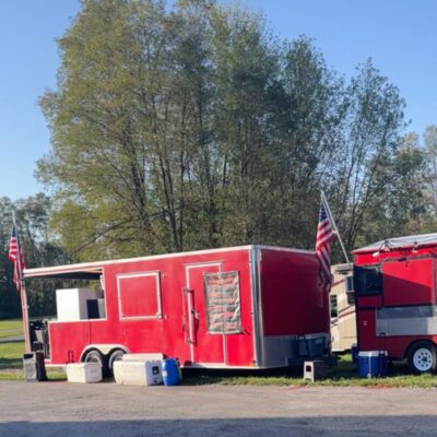 Two trucks featuring Tex-Mex barbecue
in one (tacos, burritos, nachos, sandwiches burgers, etc.) and stirfry with rice and noodles, meats in the other.